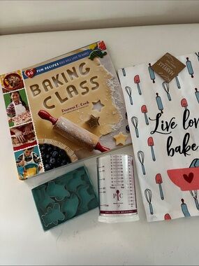 Baking Class Cookbook w/ P/C measuring cup, animal cookie cutters and tea towel